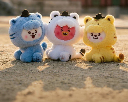 Seven fluffy tigers wearing “gat” (traditional hats)